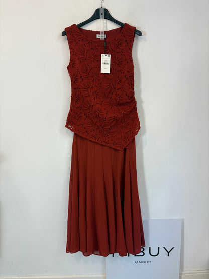 BIMANI. Conjunto top textura y falda fluida