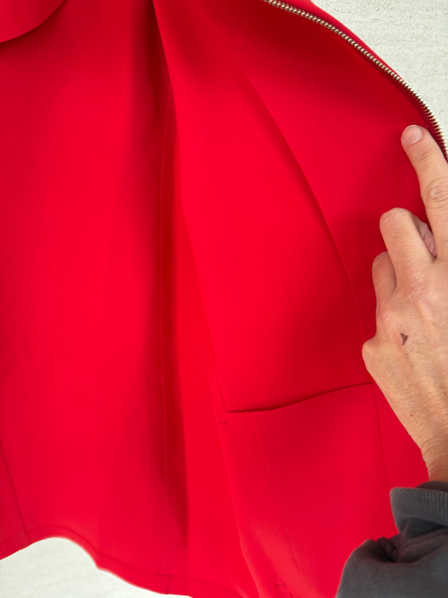 HERNO. Chaqueta roja textura