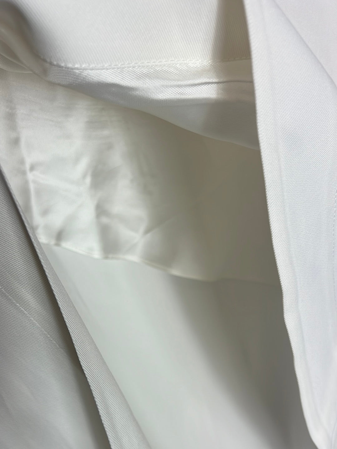 ZARA. Asymmetrical white skirt. Size m