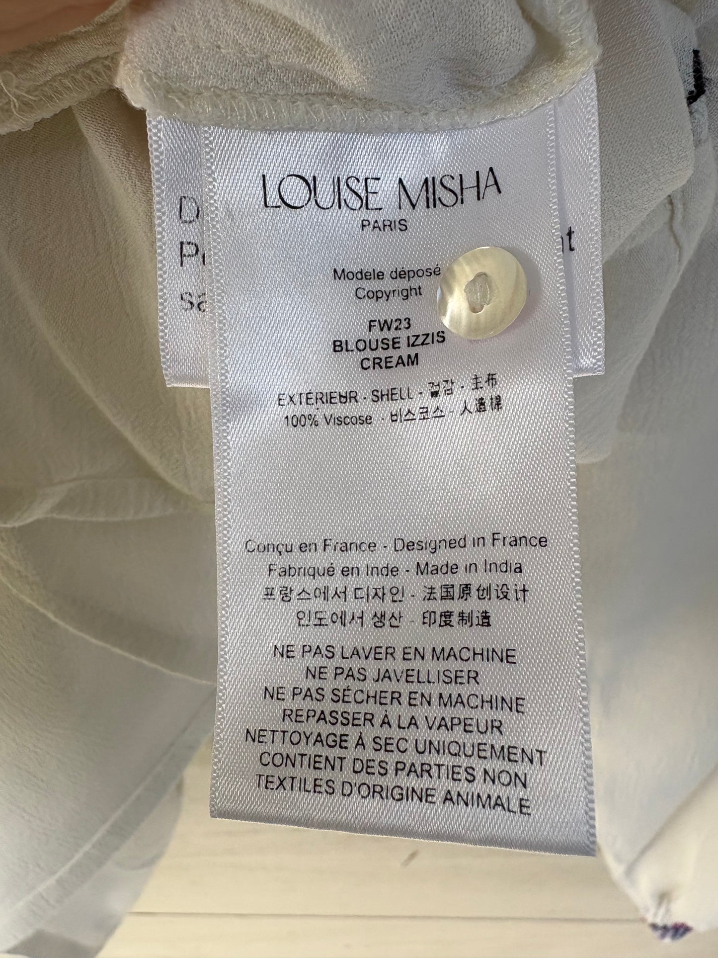 LOUISE MISHA. Blusa  fluida bordados