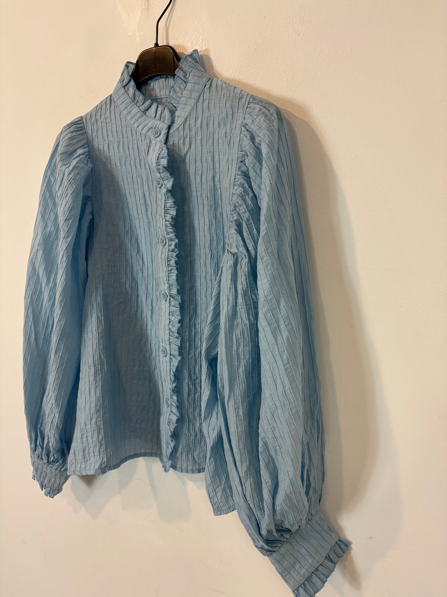 Blusa azul claro textura