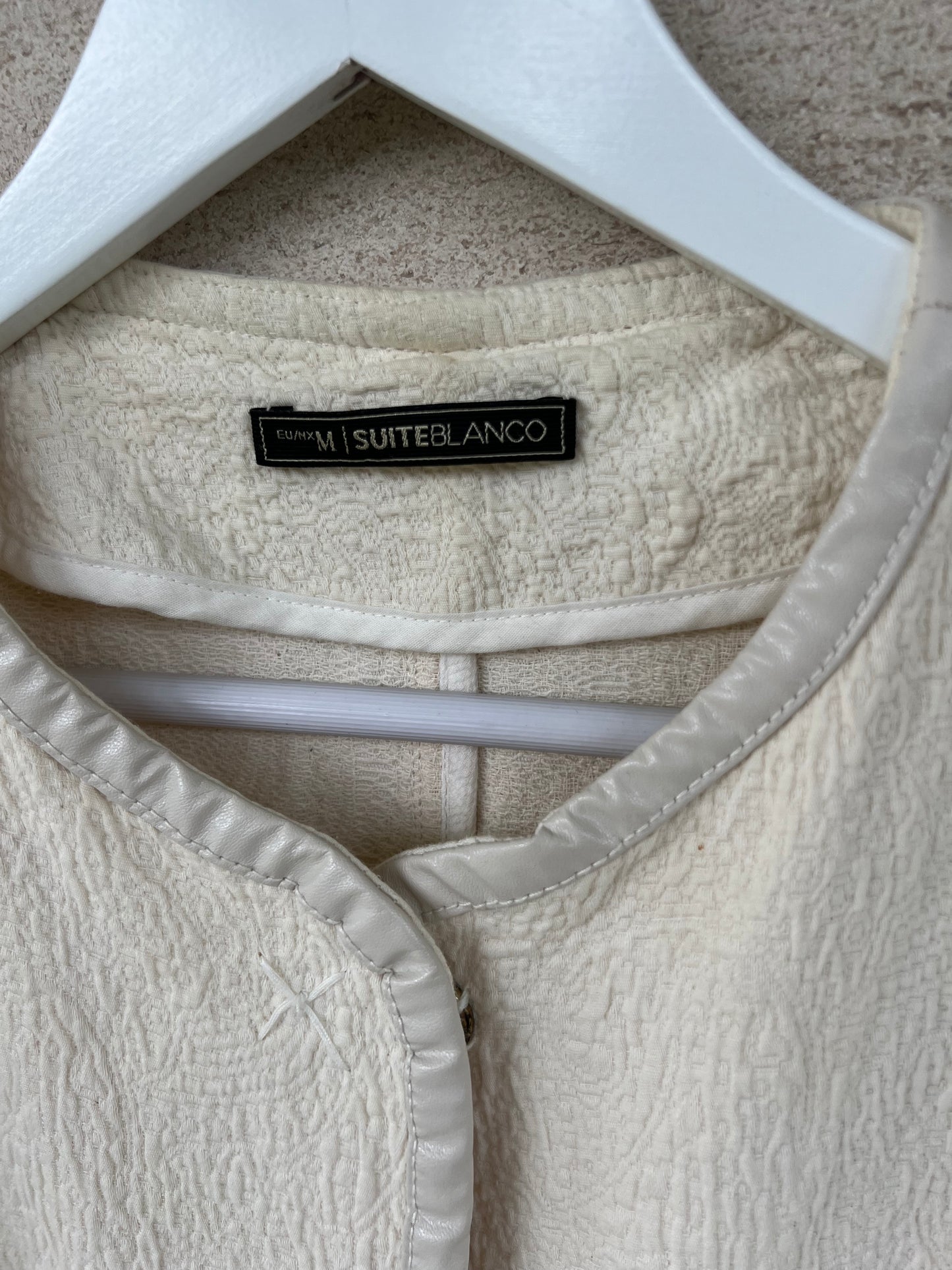 WHITE. White textured Tm jacket