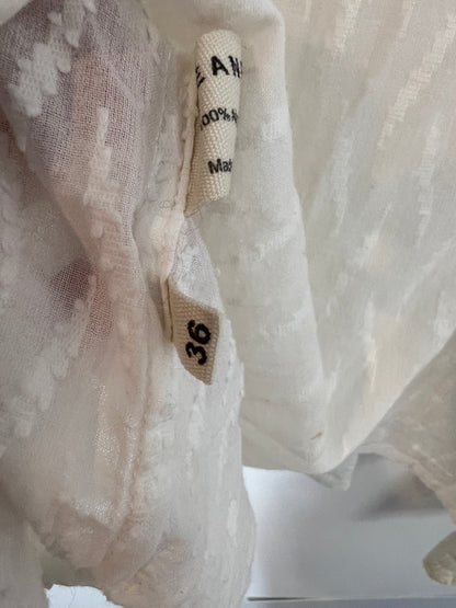 LÉANE STUDIO. White blouse with embroidered details. TS