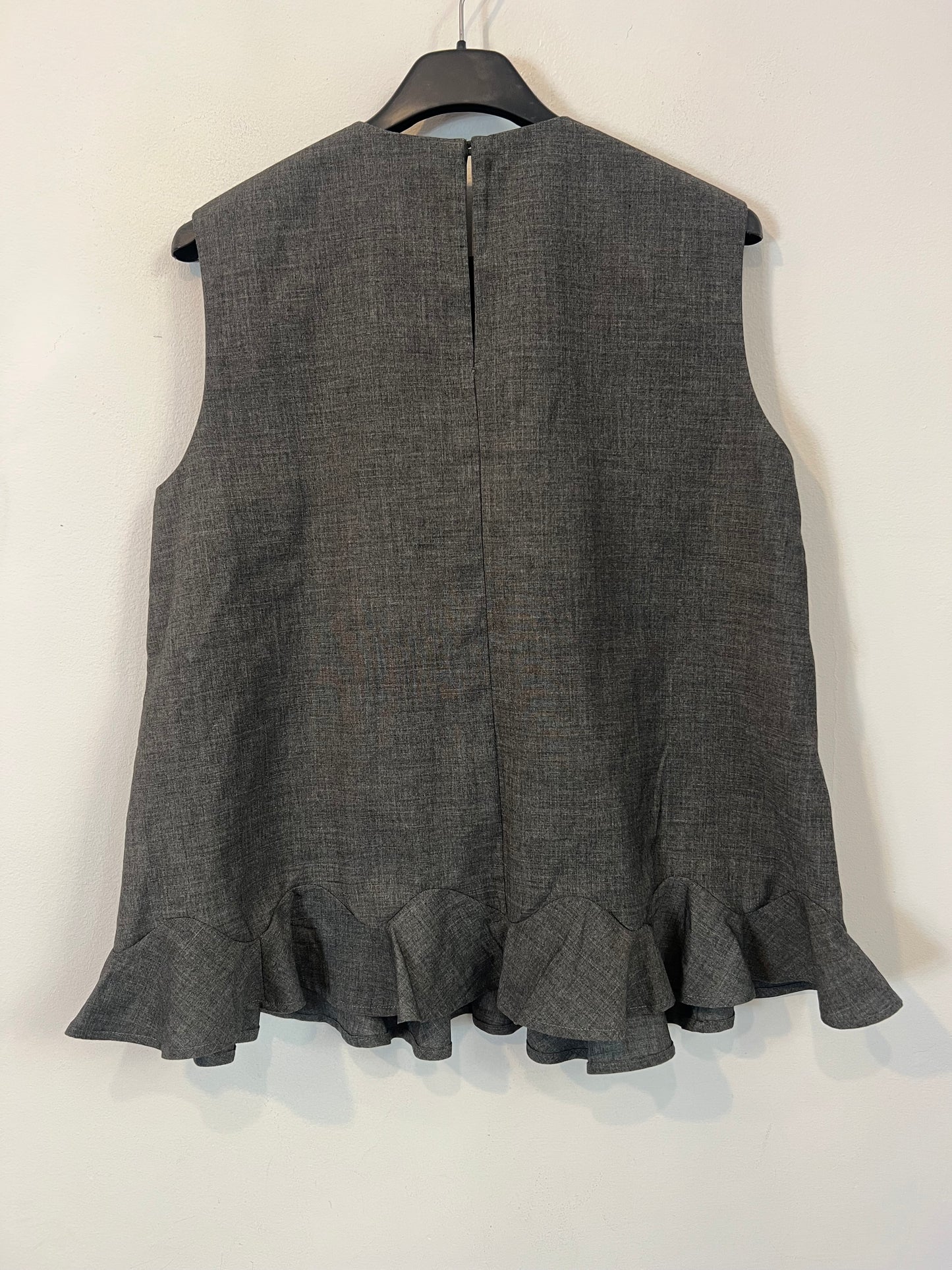 &OTHER STORIES. Top gris volante T.39