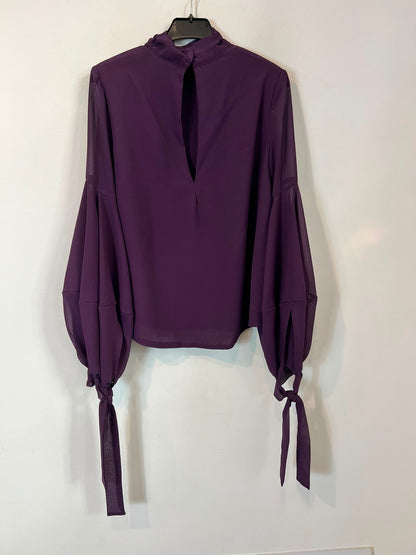 VOGANA. Blusa burdeos lazadas