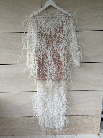 ALICIA RUEDA. Vestido plumas