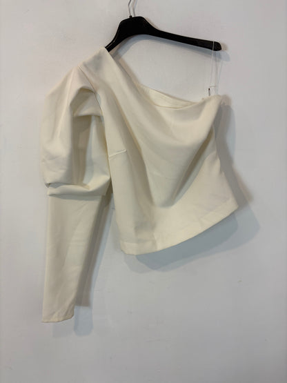 OTHERS. White asymmetrical top with puffed sleeves. TM