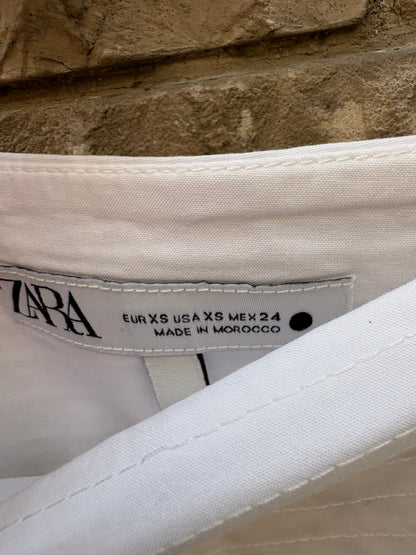 ZARA. Falda blanca midi cintura