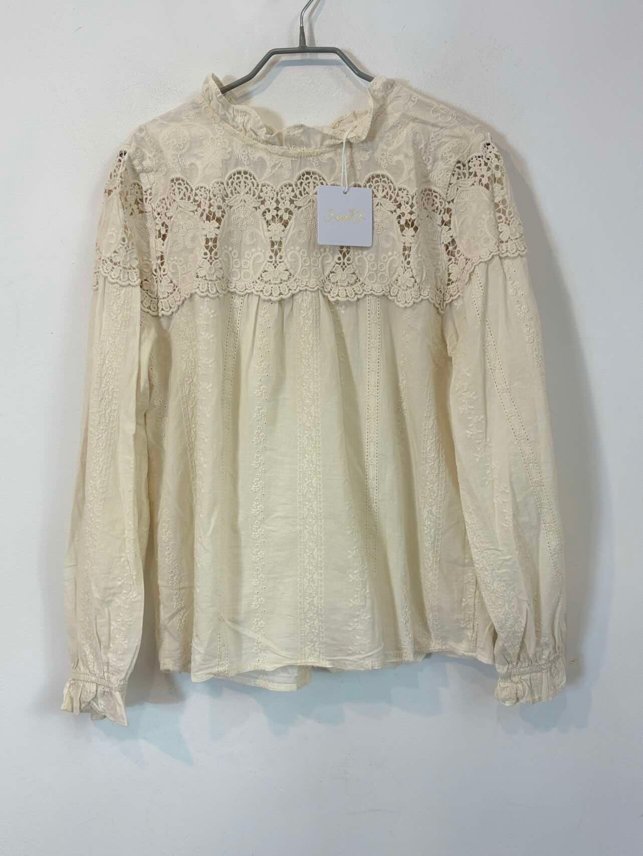 CARLOTA&CO. Blusa color crudo detalles bordados