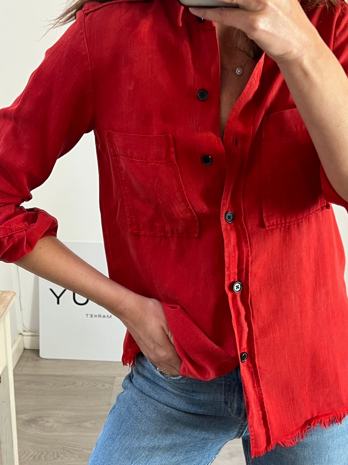 ZARA. Over a red shirt. TS
