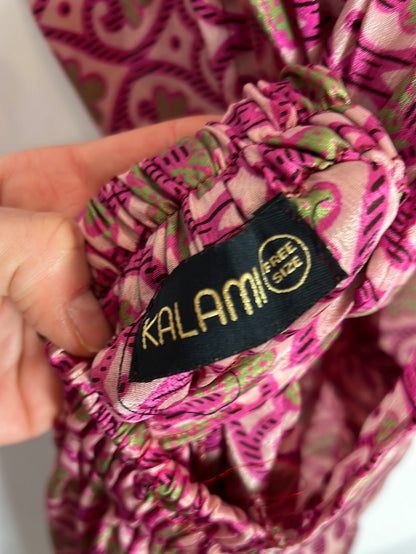 KALAMI. Mono fluido rosa detalle espalda. TU (M)