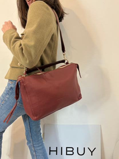 ADOLFO DOMINGUEZ. Bolso piel burdeos doble asa