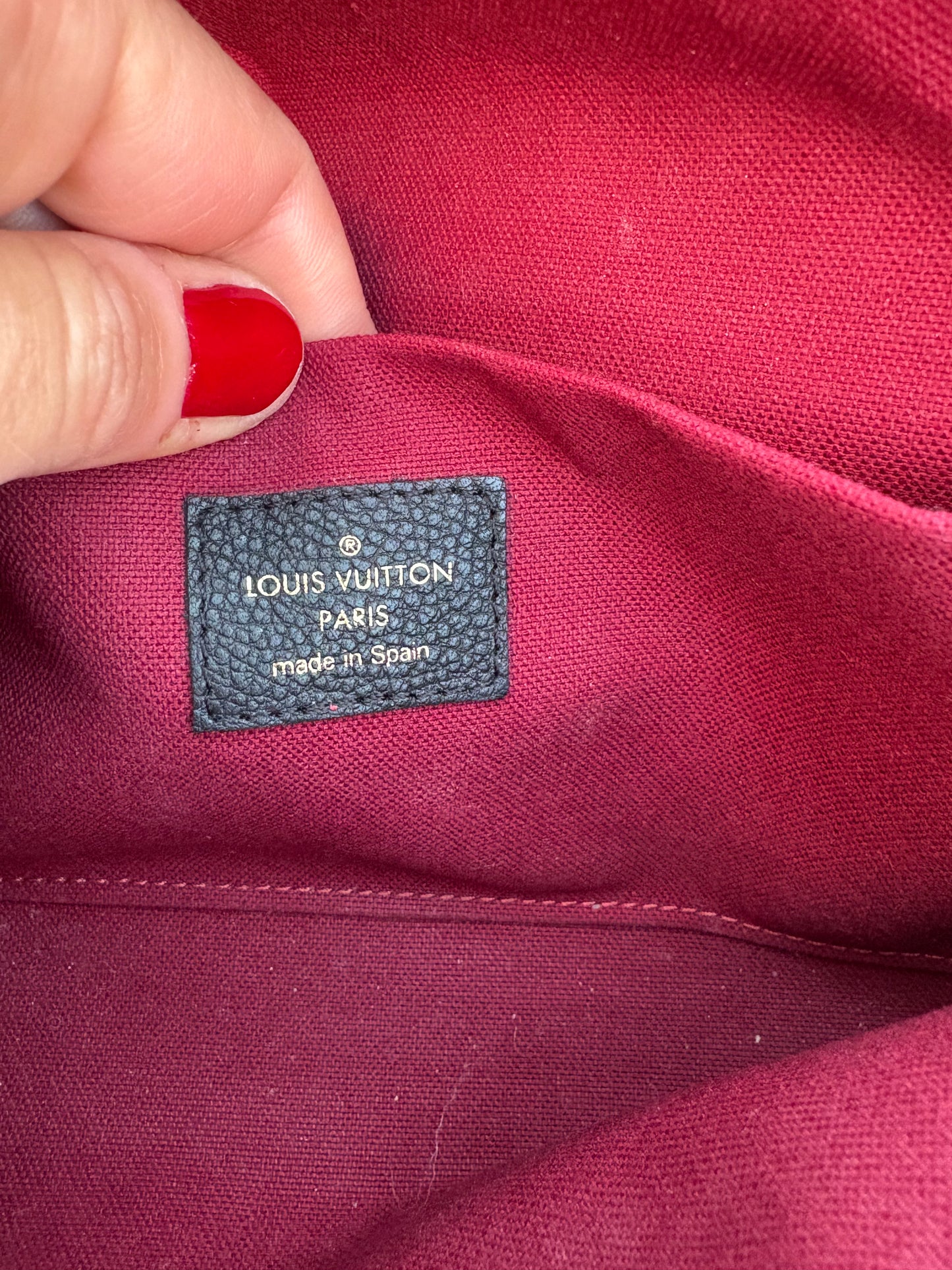 LOUIS VUITTON. Cartera de mano Félicie