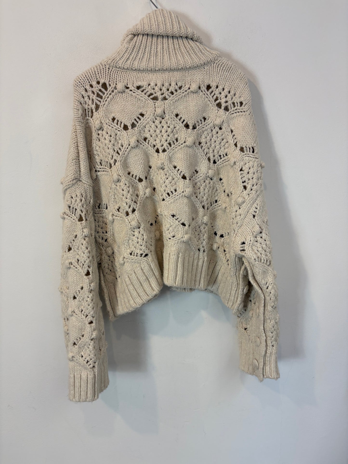 ZARA. Jersey crudo borlas