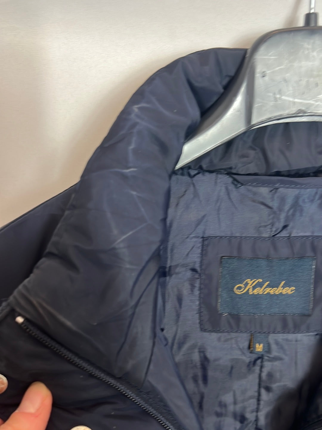 KELREBEC. Plumas azul detalle cremallera. T M