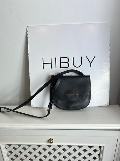 AMT. Flat black mini bag