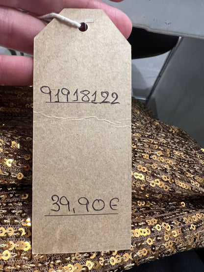 A PIE DE CALLE . Vestidor corto lentejuelas ocre T.u (m)