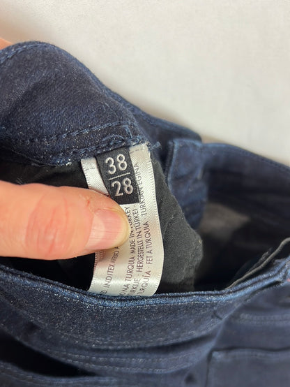 UTERQÜE. Pantalón denim volantes T.38