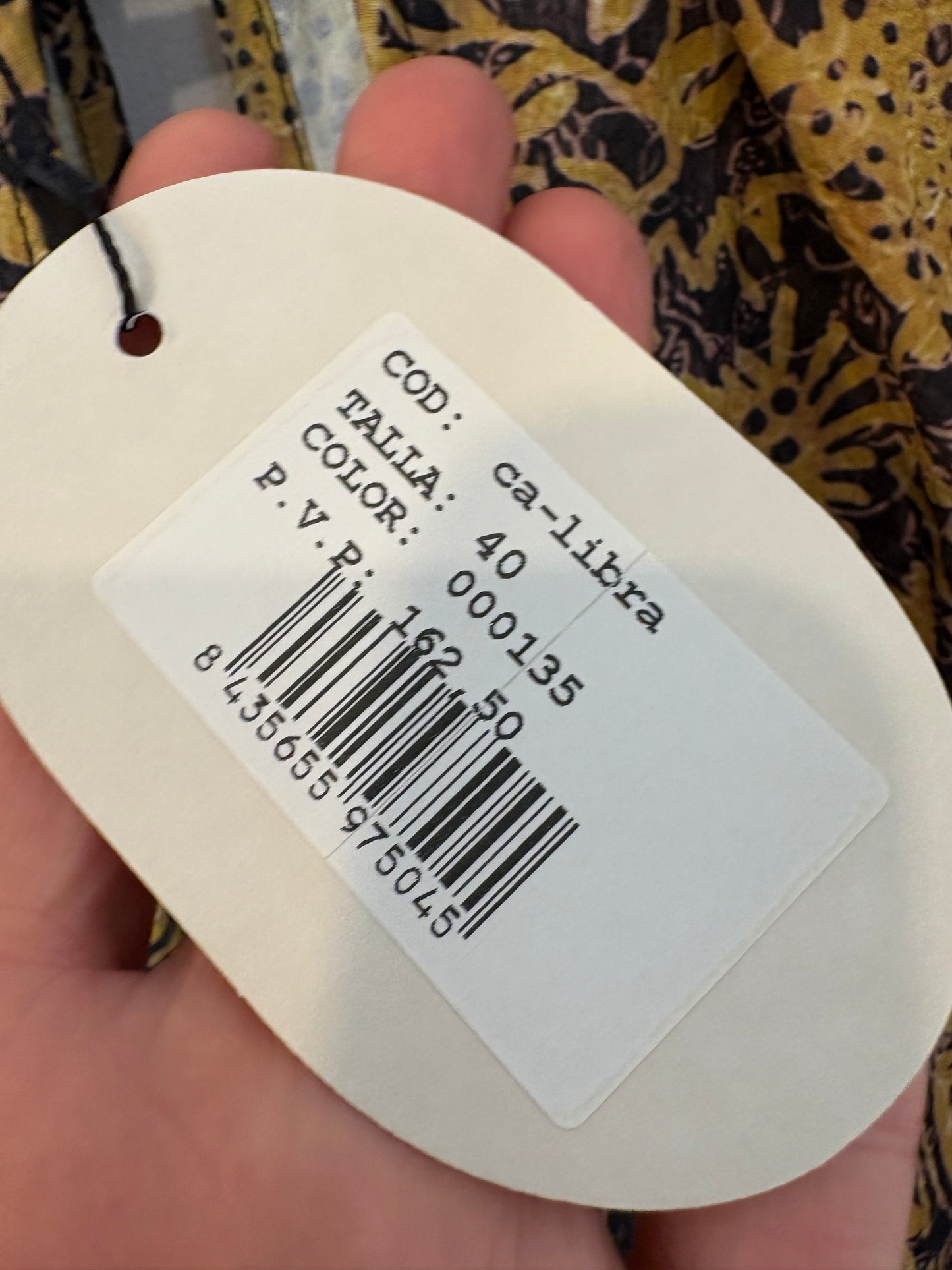 PANAMBI. Blusa estampada hombreras