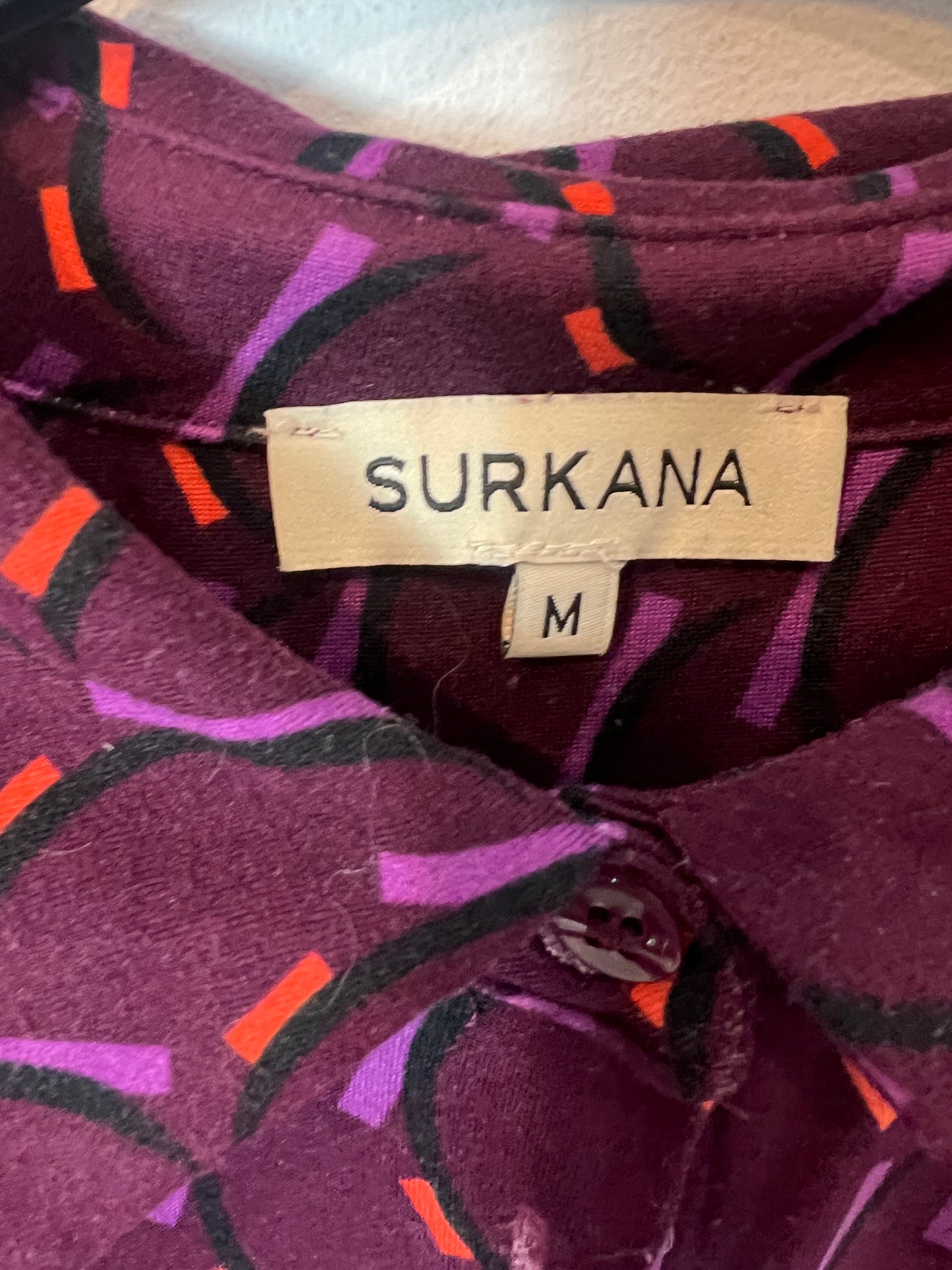 SURKANA. Total look estampado retro. T M