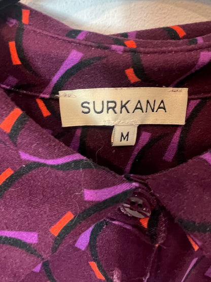 SURKANA. Total look estampado retro. T M