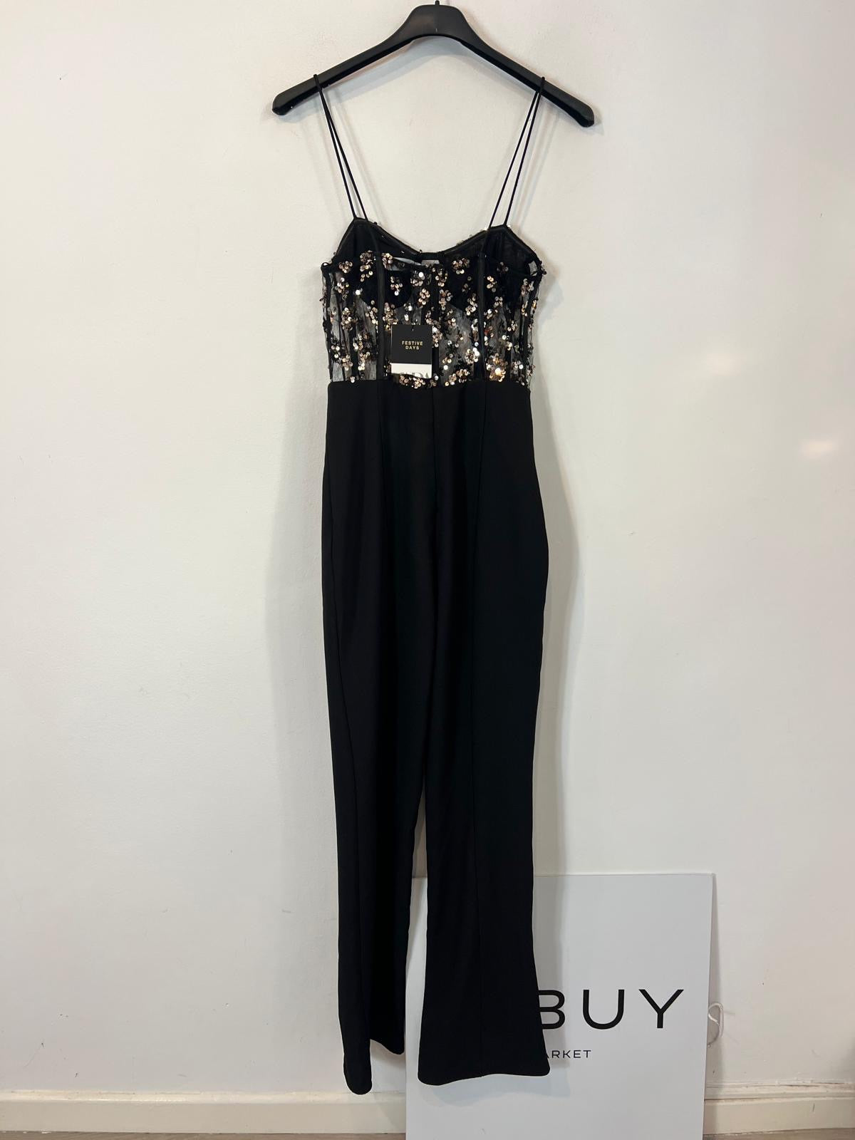 ZARA. Mono negro lentejuelas