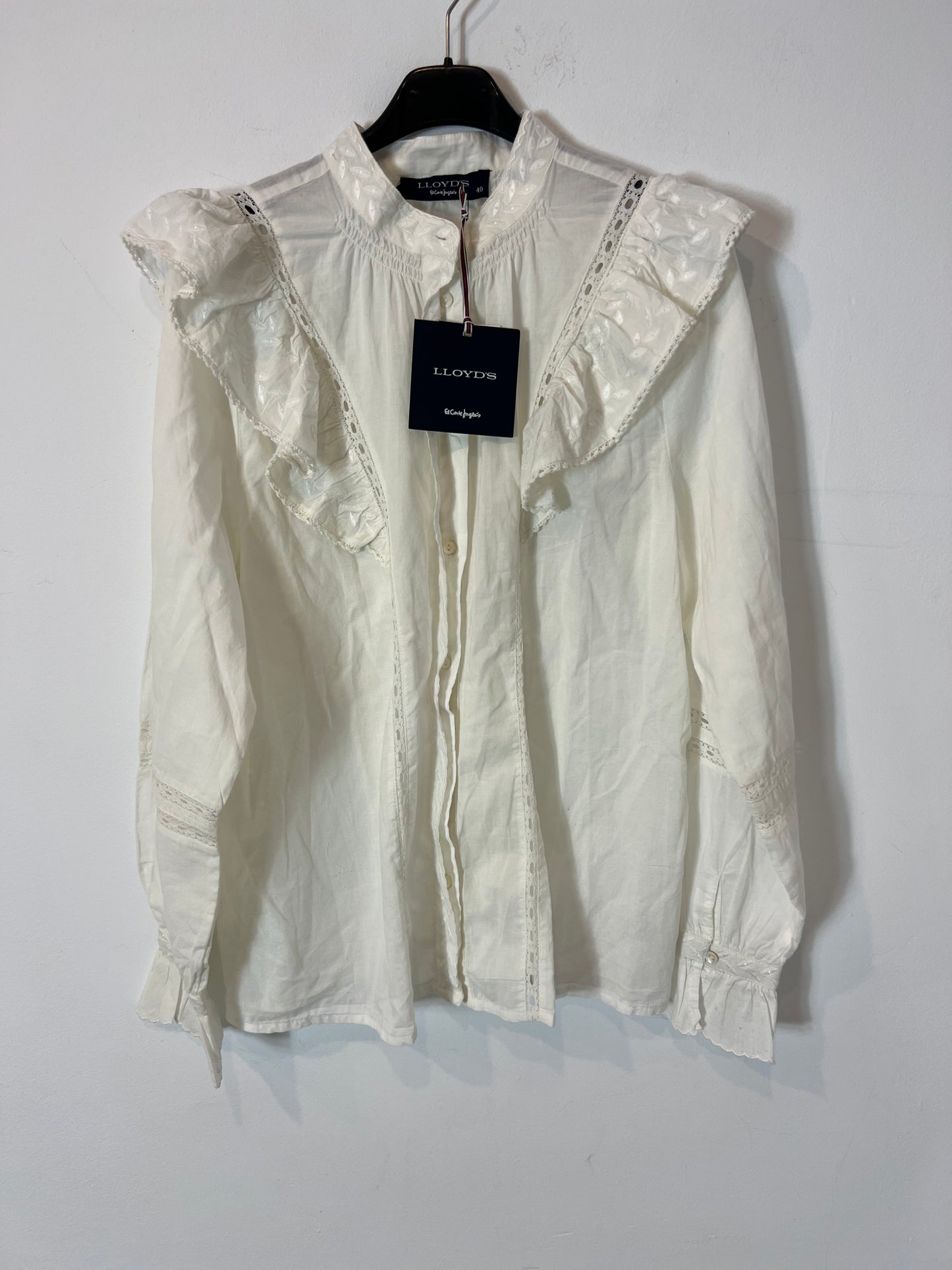 LLOYD'S. White ruffled blouse, size 40
