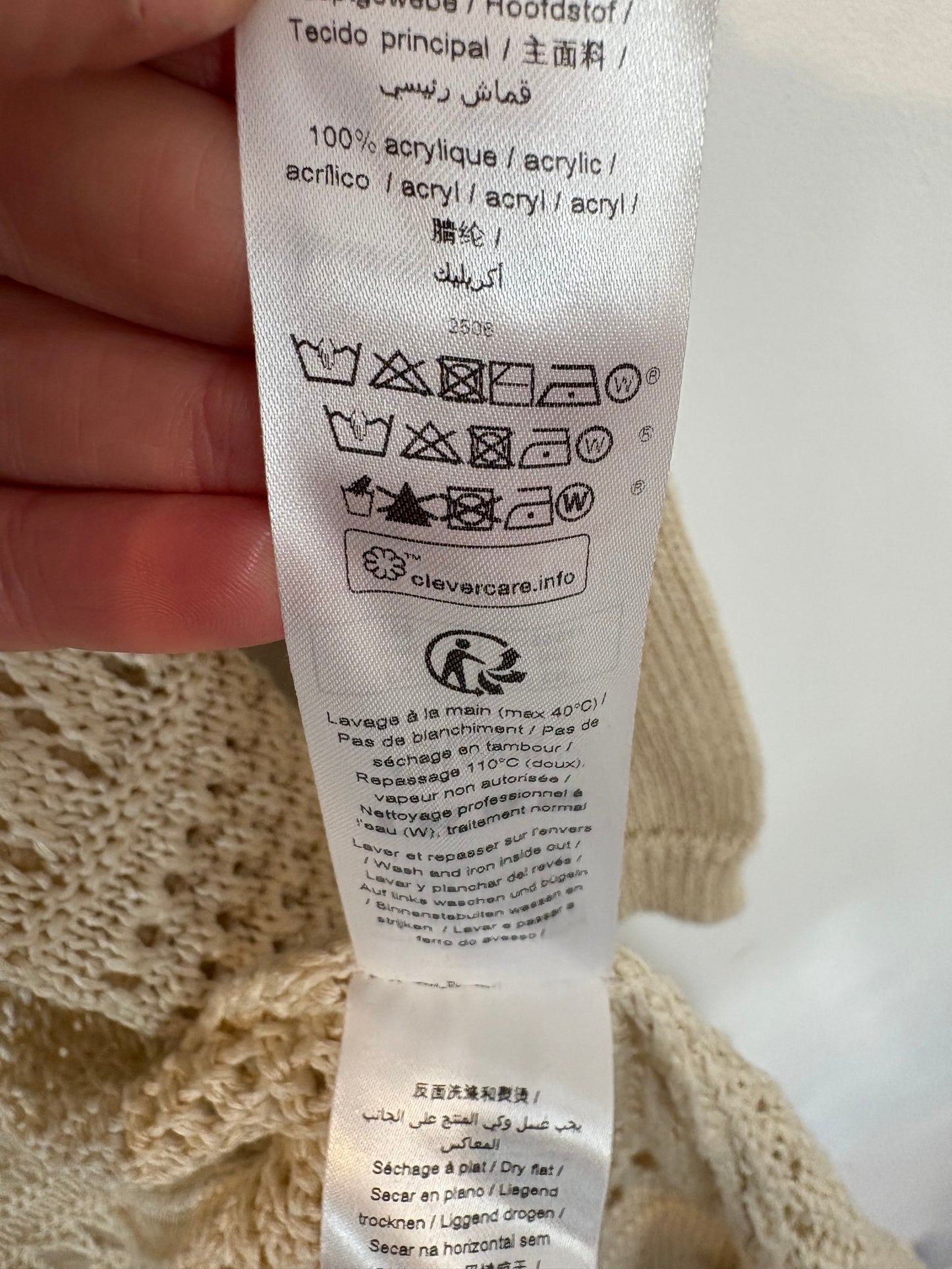 IKKS. Chaqueta calada beige flecos
