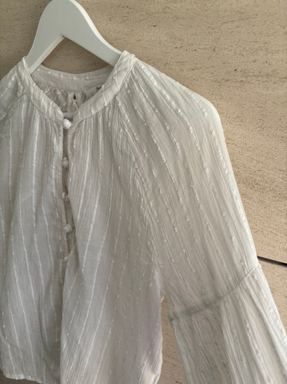 INTROPIA. blusa  blanca detalle espalda T.s