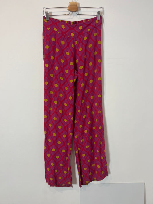 NÍCOLI. Pantalón  pata ancha estampado rosas. T 18 (S)
