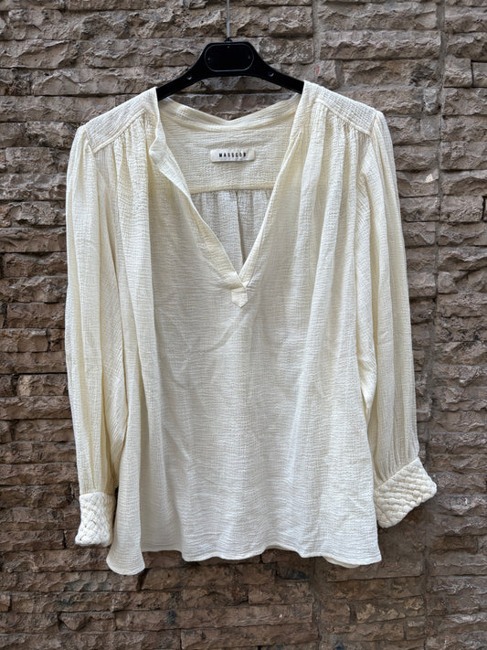 MASSBOB. Blusa vainilla detalle puño
