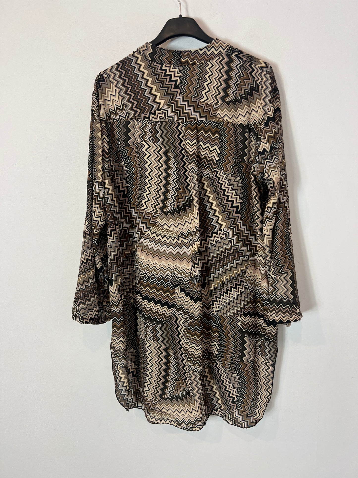NEW. Flowy brown print blouse. TM/L