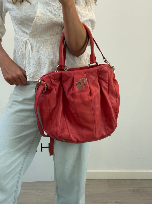 PURIFICACIÓN GARCIA. Bolso rojo piel doble asa