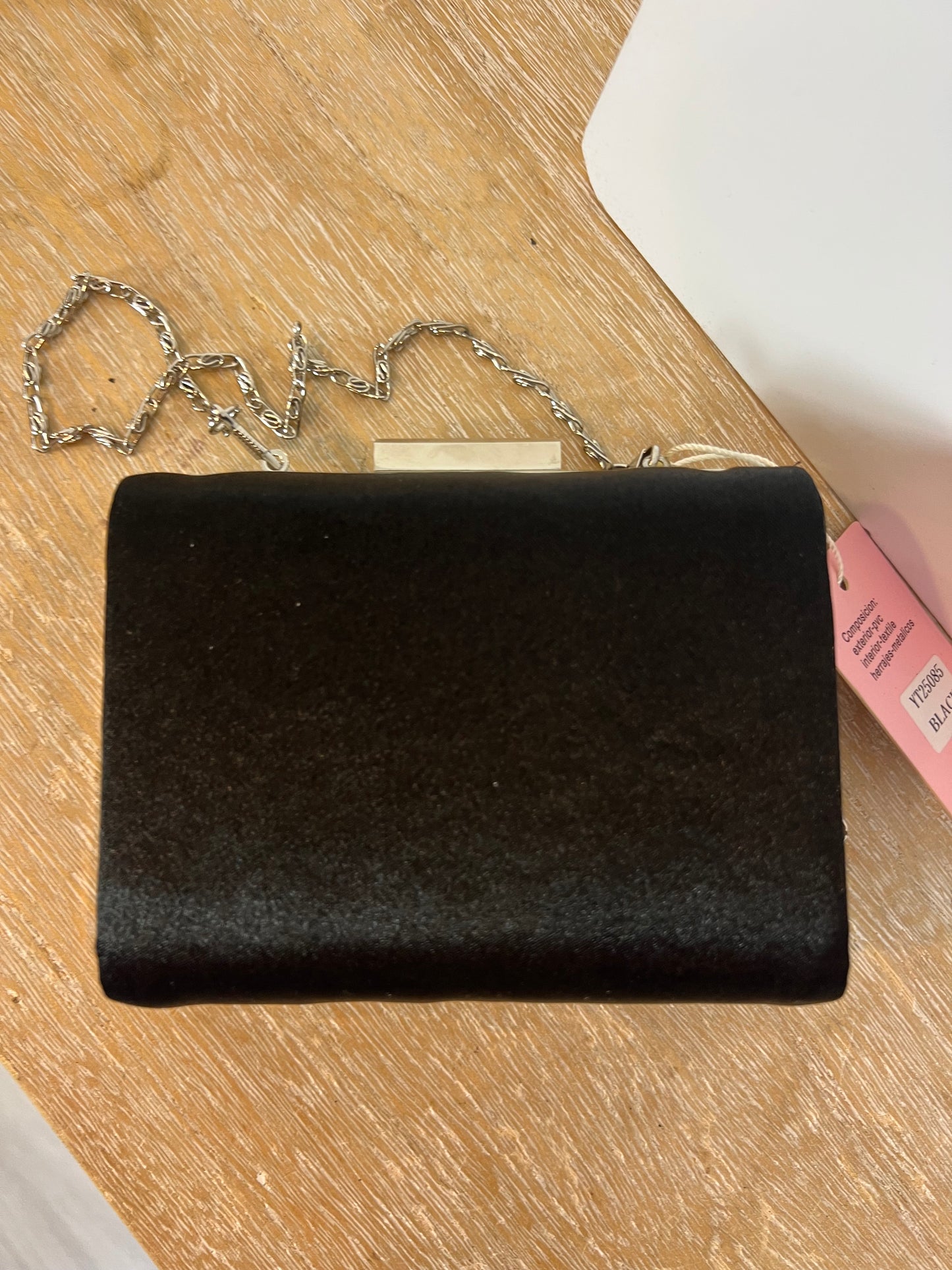 OTRAS. bolso mini negro trenzado