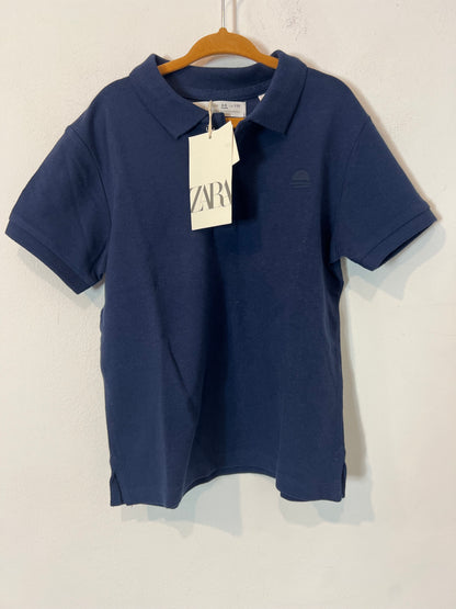 ZARA. Polo azul  niño. T 4-5 años