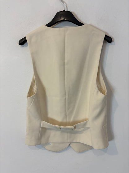 OTRAS. Chaleco abotonado beige claro