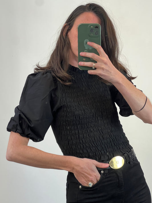 H&M. Top negro nido abeja