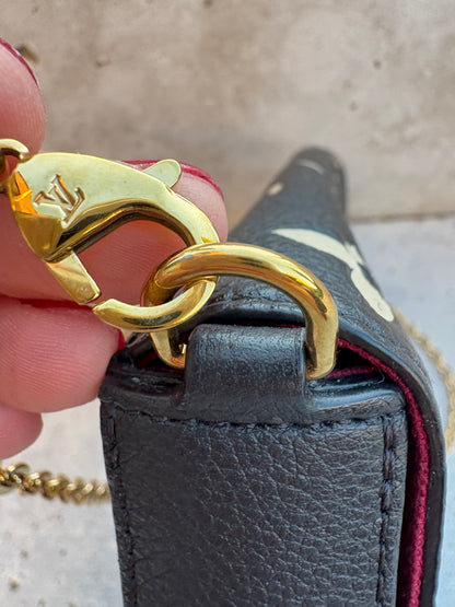 LOUIS VUITTON. Cartera de mano Félicie