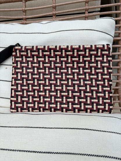 BIMBA Y LOLA. Cartera de mano trenzada