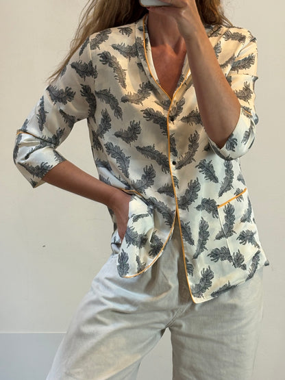 ERRE. Total look fluido estampado hojas