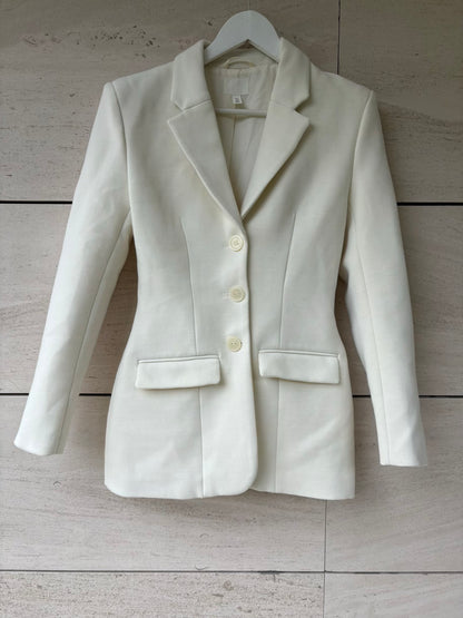 H&M. Chaqueta estructura color crudo