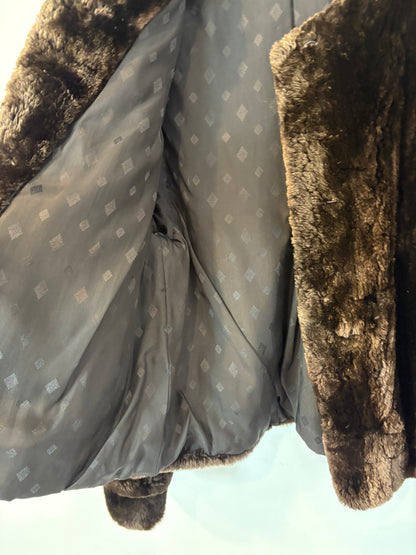 OTRAS. Chaqueta visón bolsillos