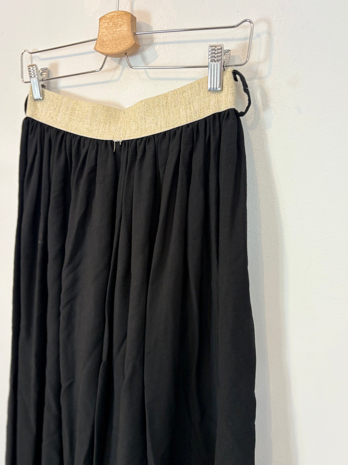 OTRAS. Pantalón fluido pata ancha