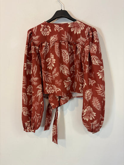 THE NEW SOCIETY. Conjunto blusa y falda cruzada