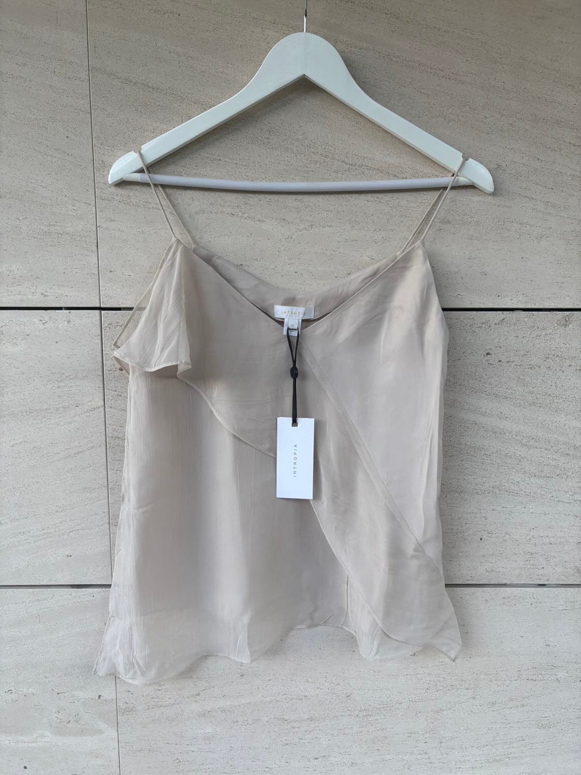 INTROPIA.Top beige texturas