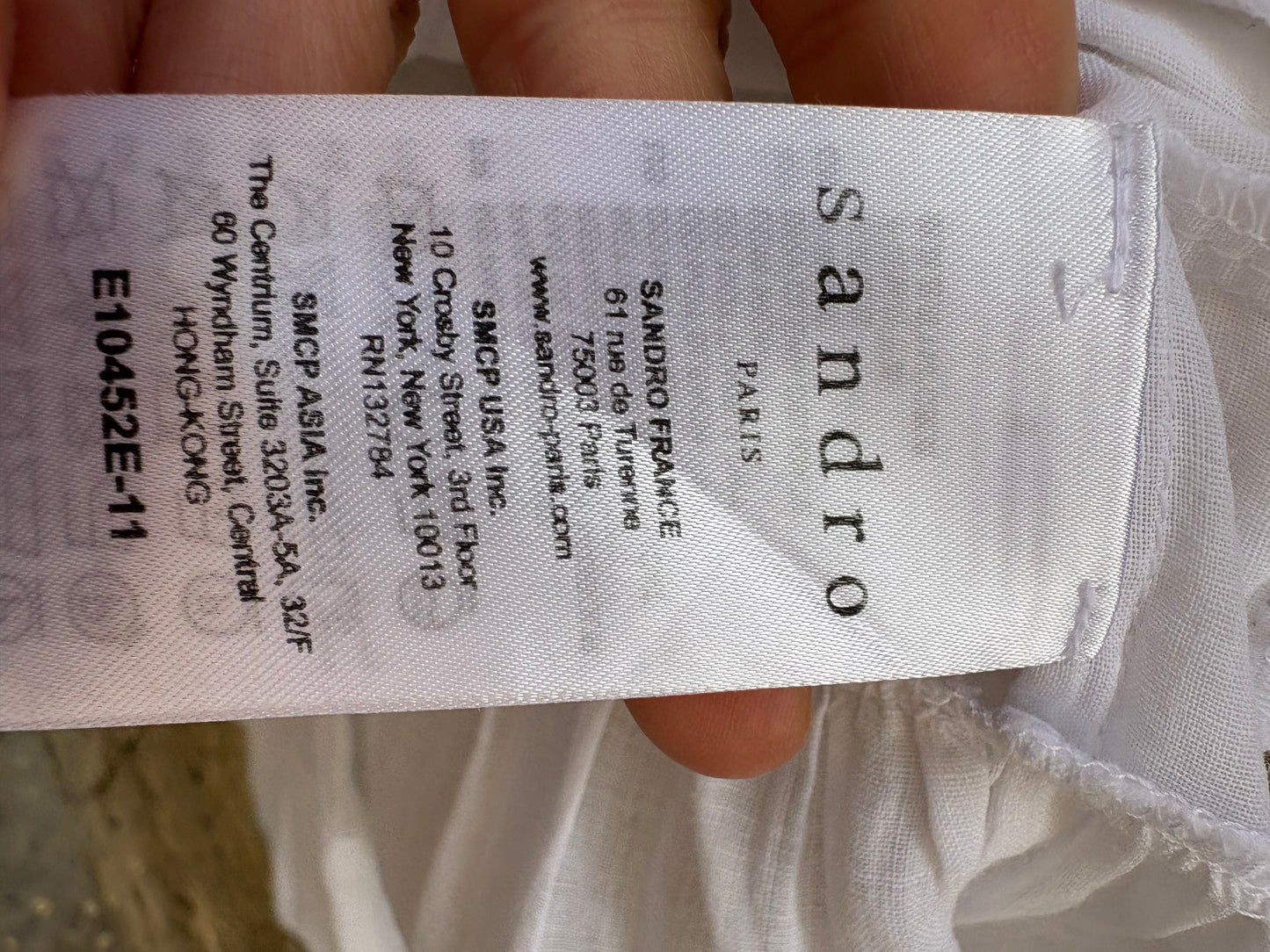 SANDRO. Top blanco volante