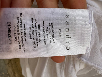 SANDRO. Top blanco volante