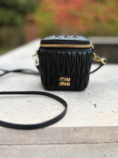 MIU MIU. Matelassé nappa leather micro bag