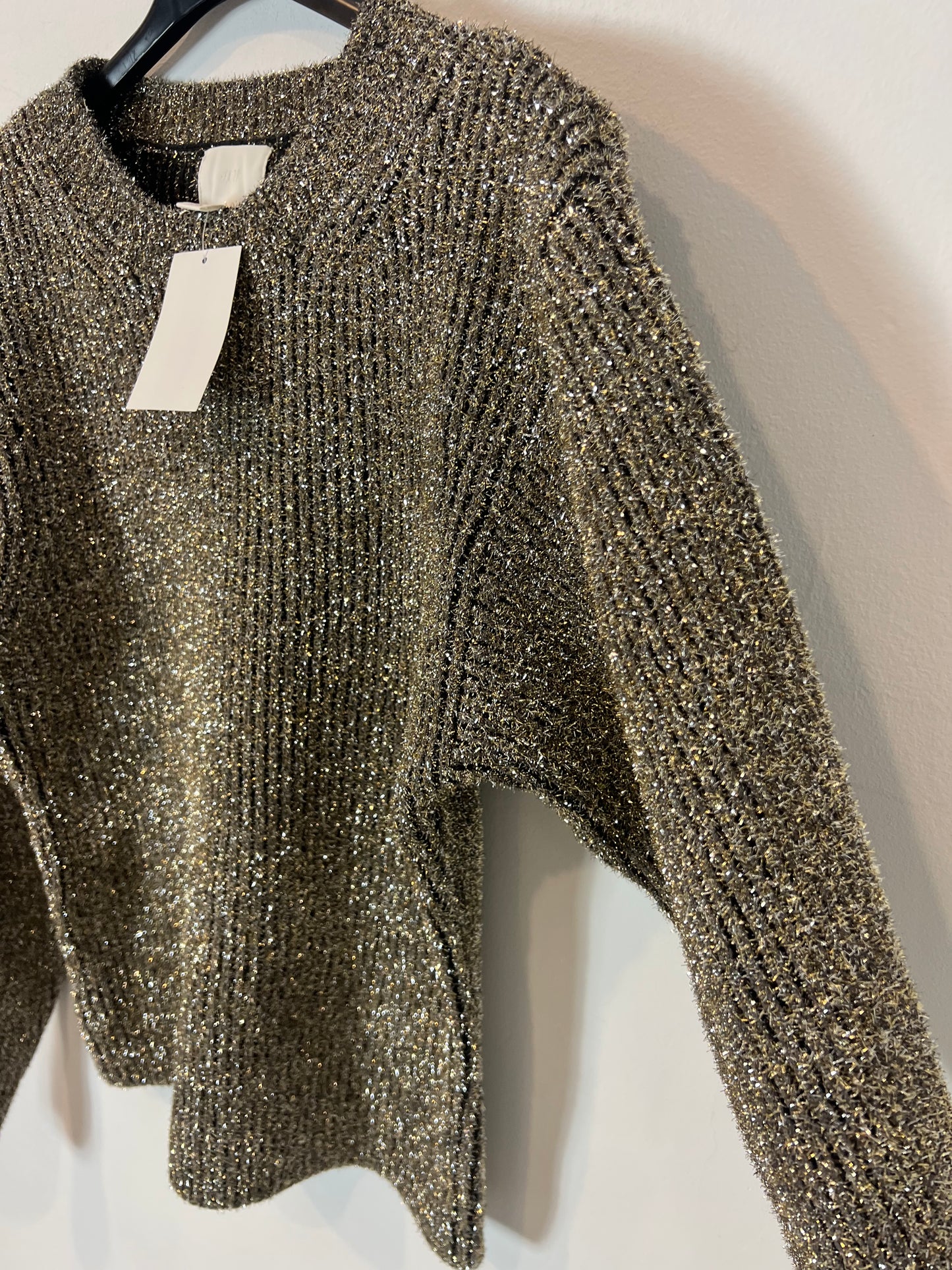 H&M. Jersey textura hilos brillo. T M