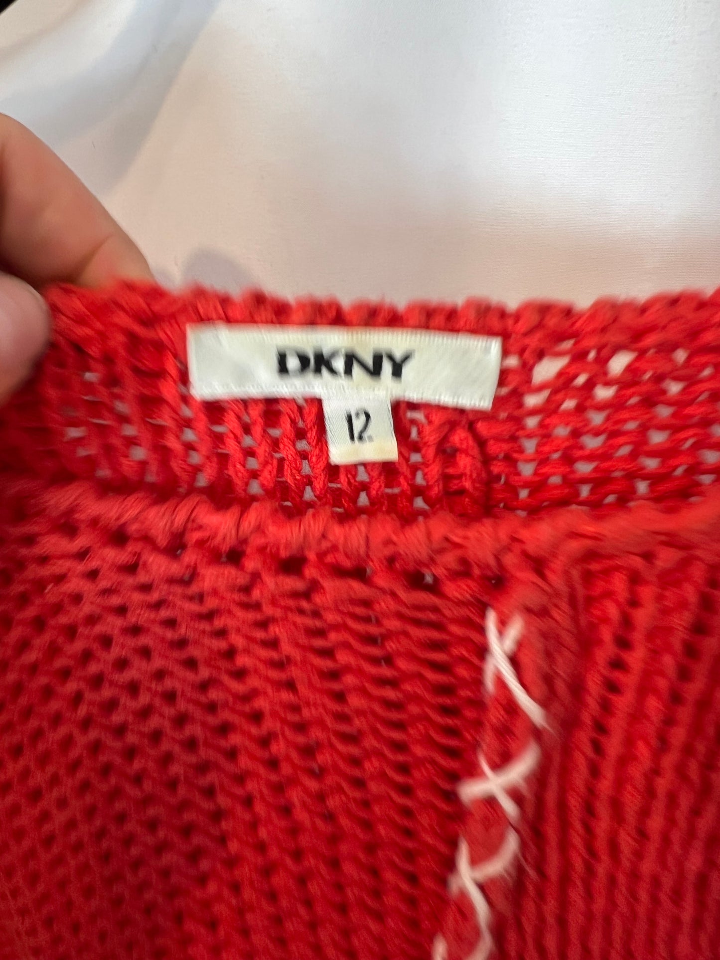 DKNY. Red sweater with details. Size 12 (XS)